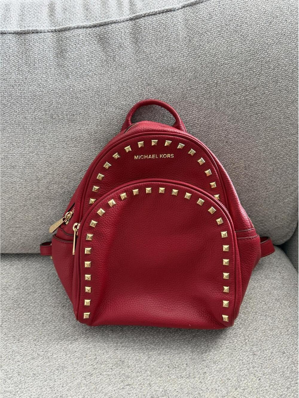 Michael Kors Abbey Backpack with Red Pebbled Leather with Gold-Tone Studs